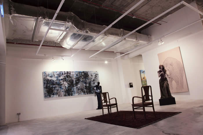Faisal and Munkao's works at Wei-LIng Contemporary with paired gowns