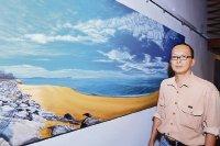 Chen Wei Meng and a piece on the Terengganu beach. — Pictures by Goh Thean Howe