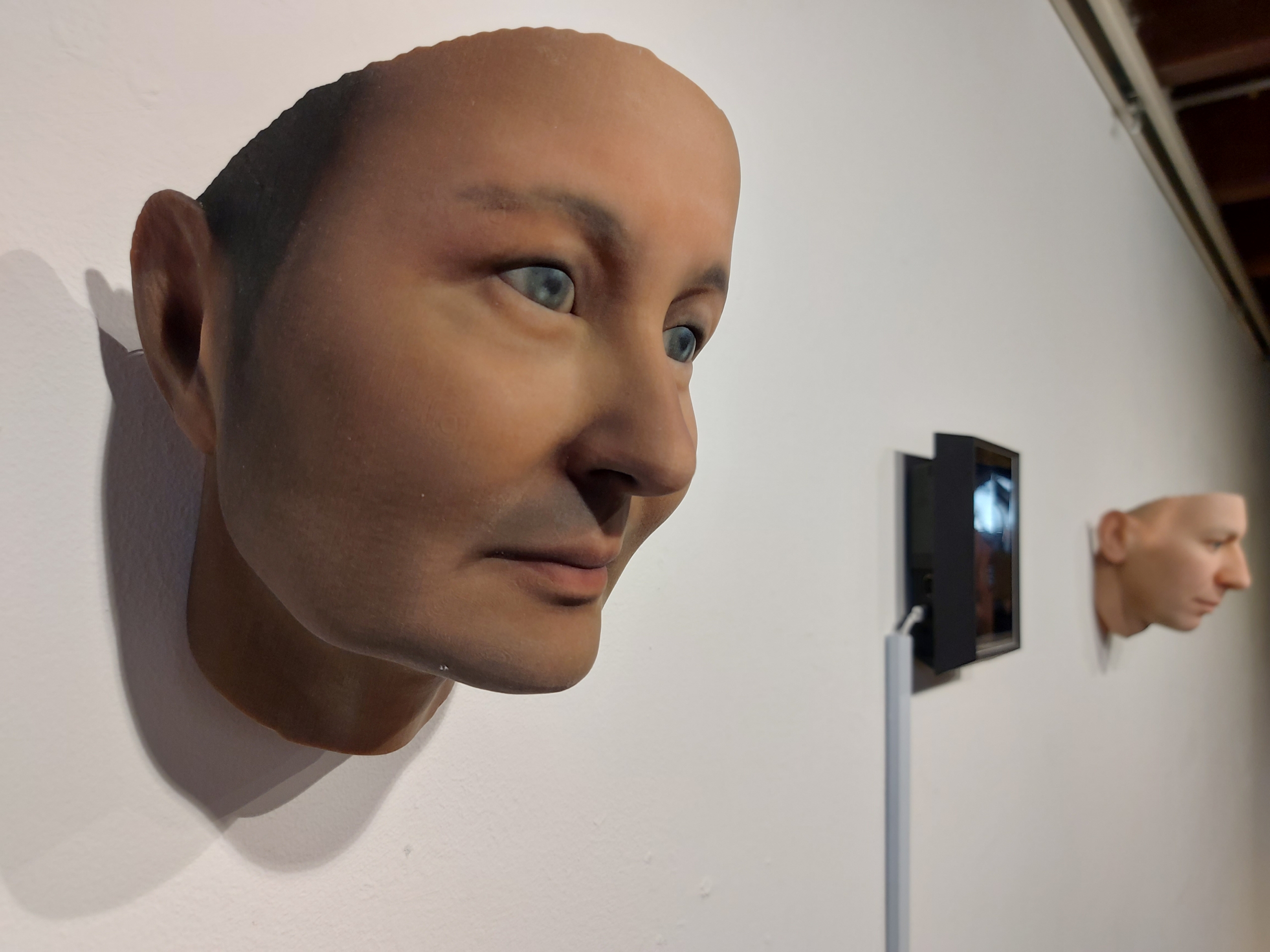 Installation view: Heather Dewey-Hagborg - Watson’s Ghost (2021) | Two 3D printed portraits, with holographic video presented on a Looking Glass Portrait; 8 x 8 x 6 inches